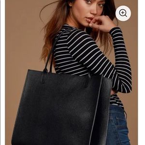 Black leather tote bag